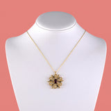 K. Goldschmidt Diamond & Garnet Pinwheel Pendant Necklace