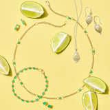 Huggie Hoop Earrings in Emeralds