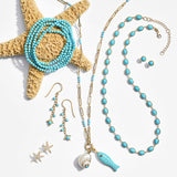 White Shell with Turquoise Charm